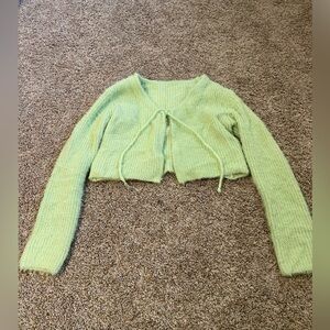 Light Green fuzzy cardigan ties in the front.